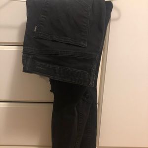 black knee ripped high rise jeans